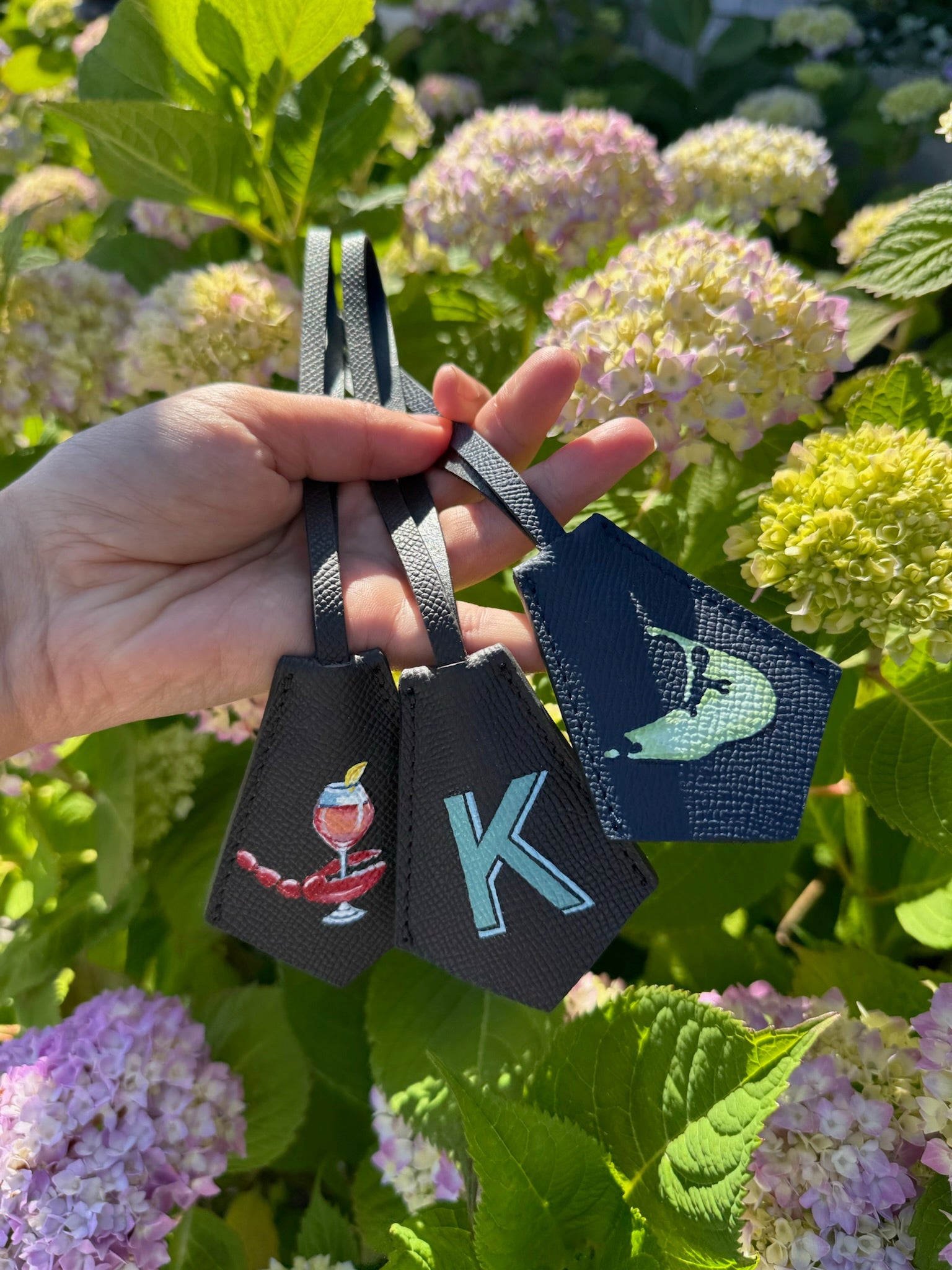 Personalized leather keyring bag charm with a hand-painted monogram — Cou
